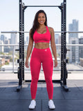 Elkie wearing the LTD EDITION red high-waisted leggings, front