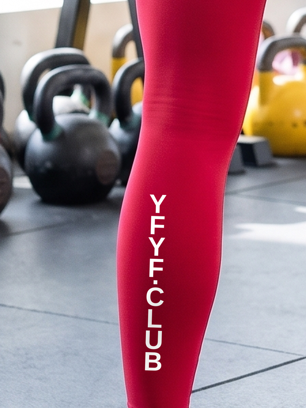 YFYF Cherry White Logo leggings, close-up of YFYF.CLUB on the left calf