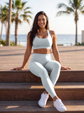 Mist Blue Full Brand high-waisted leggings, front on model with white FF on the waistband