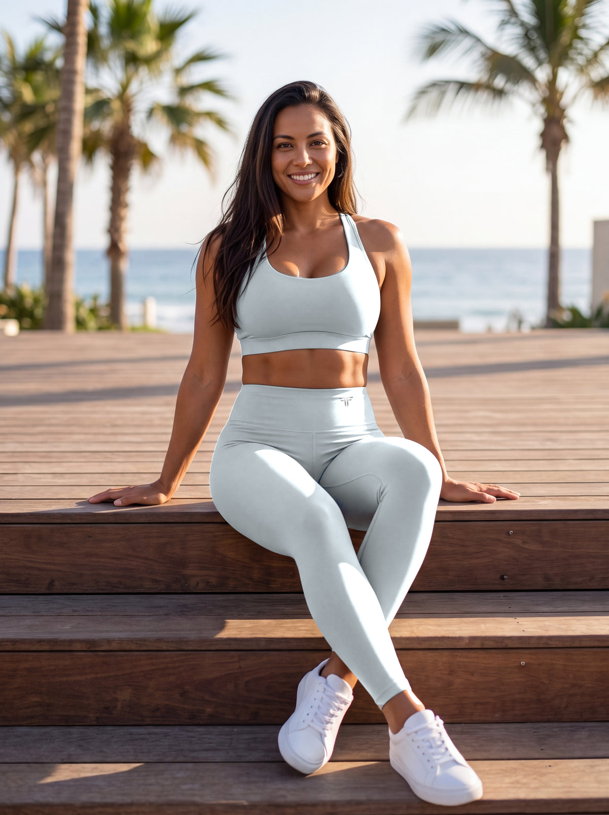 Mist Blue Full Brand high-waisted leggings, front on model with white FF on the waistband