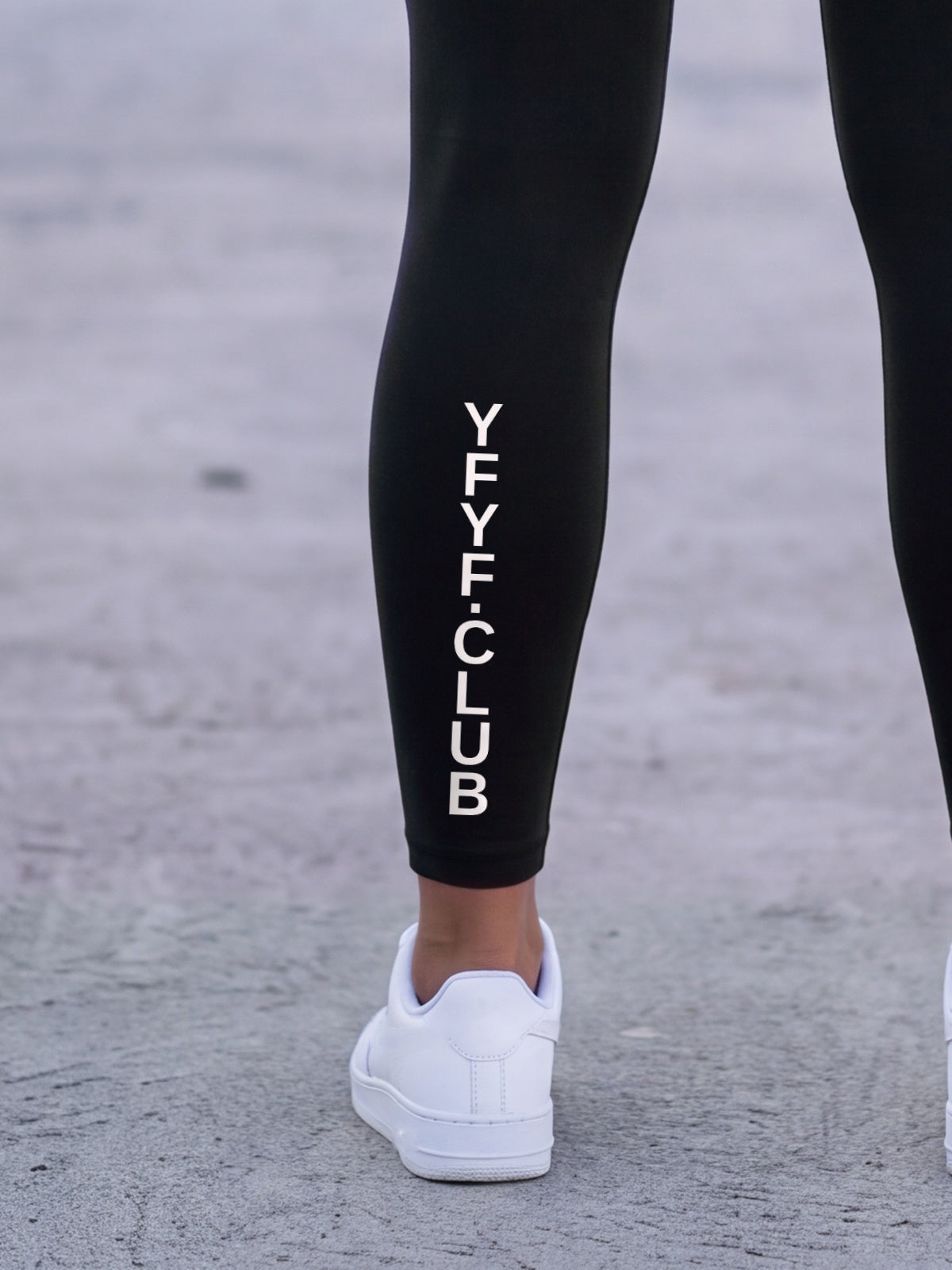 Close-up of the calf print on the LTD Edition black leggings
