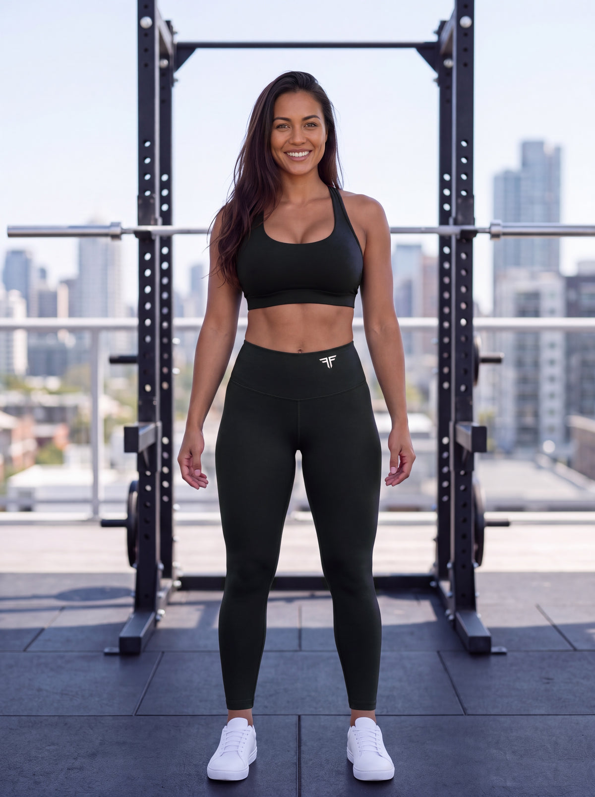 Elkie wearing the LTD Edition My Fitness Is Your Fortune leggings in black, front view