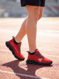 Max Soul Workout Shoes Red on feet outdoors, black sole