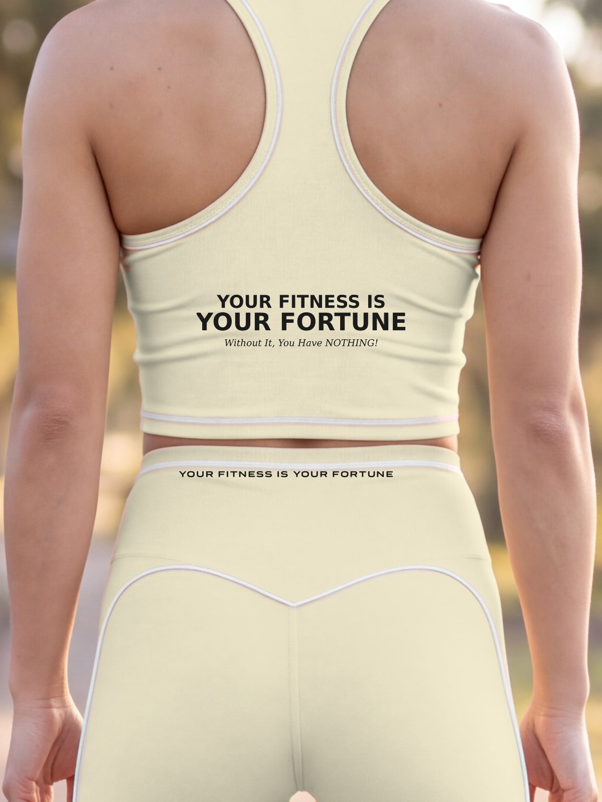 Close-up of the Your Fitness Is Your Fortune / Without It, You Have NOTHING! back print on the YFYF Fortune Racerback Crop Top – Light Apricot