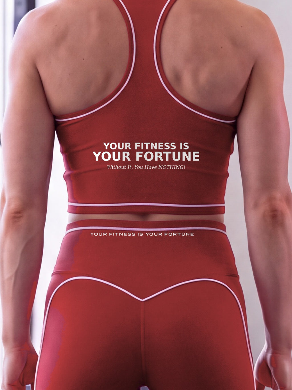 Close-up of the Your Fitness Is Your Fortune / Without It, You Have NOTHING! back print on the YFYF Fortune Racerback Crop Top – Red